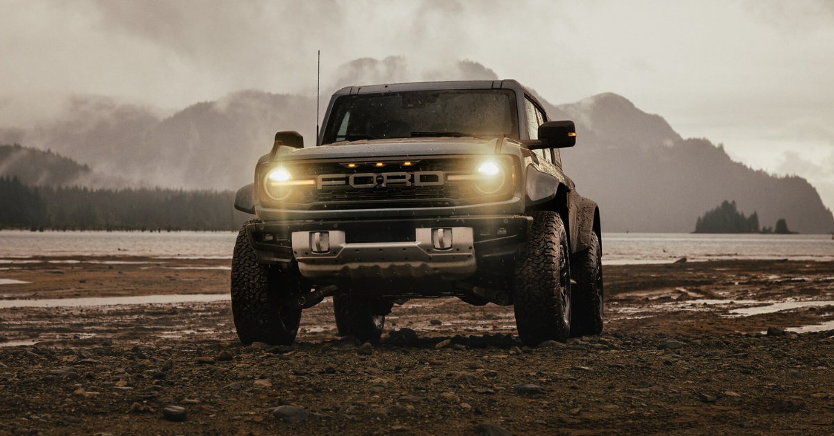 2025 Ford Bronco exterior driving through a mountainous desert