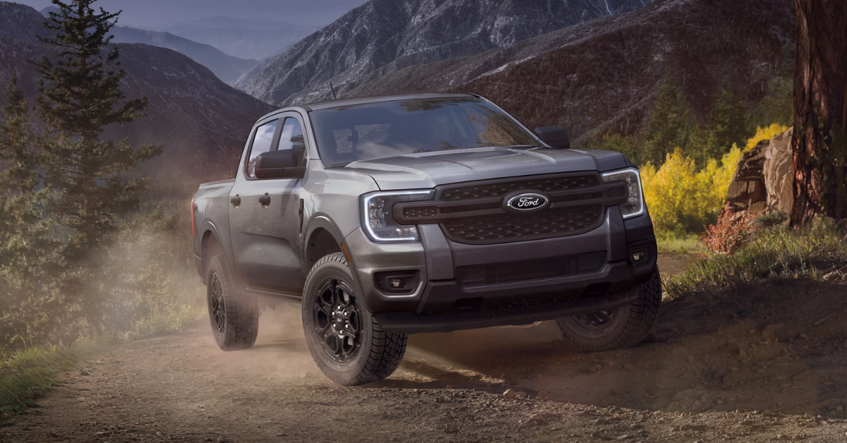 Ford Ranger Pickup Truck driving up a dirt road on a mountain