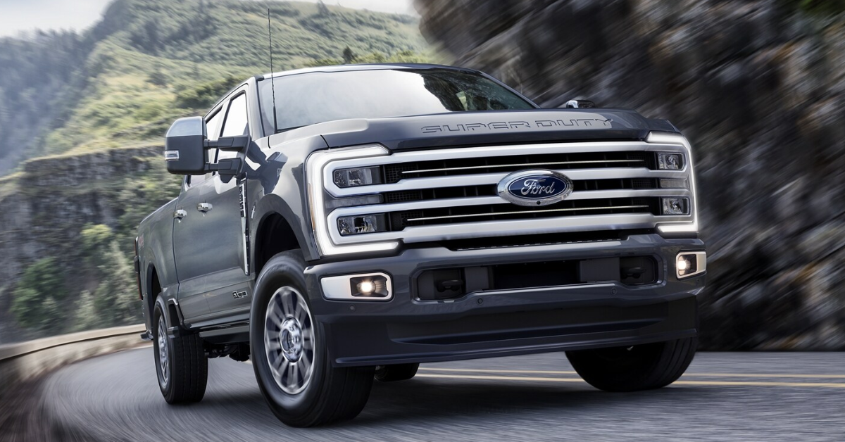 2025 Ford F-250 Super Duty driving up a highway on a country road