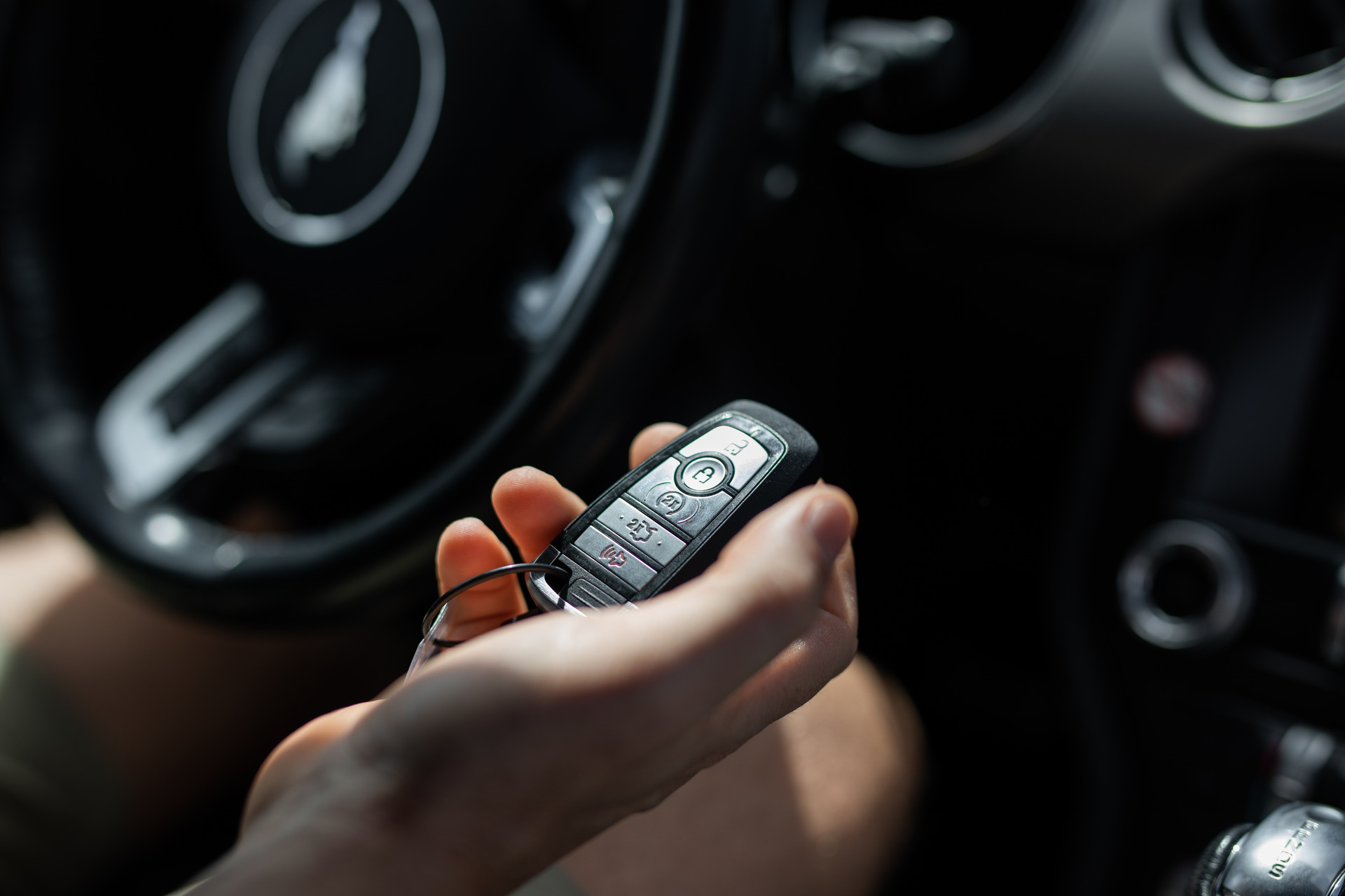 Ford key fob up close in a driver's hand