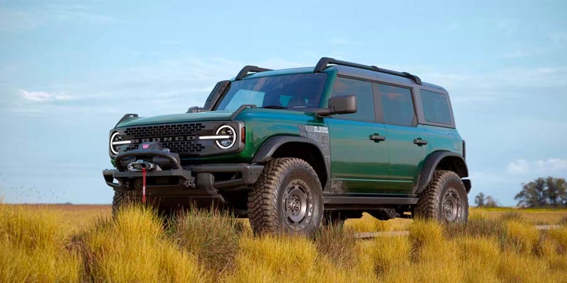 green Ford Bronco on grass